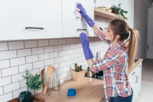 how to clean greasy kitchen cupboards​